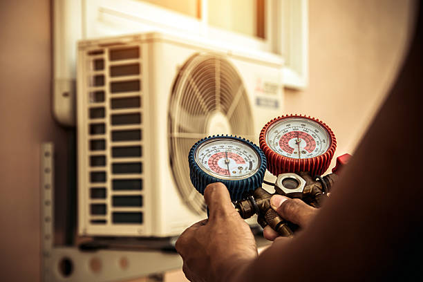 Professional Hvac technician working in Ashby, MA